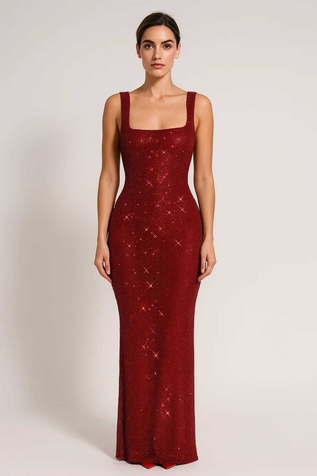 Lange aansluitende jurk met pailletten