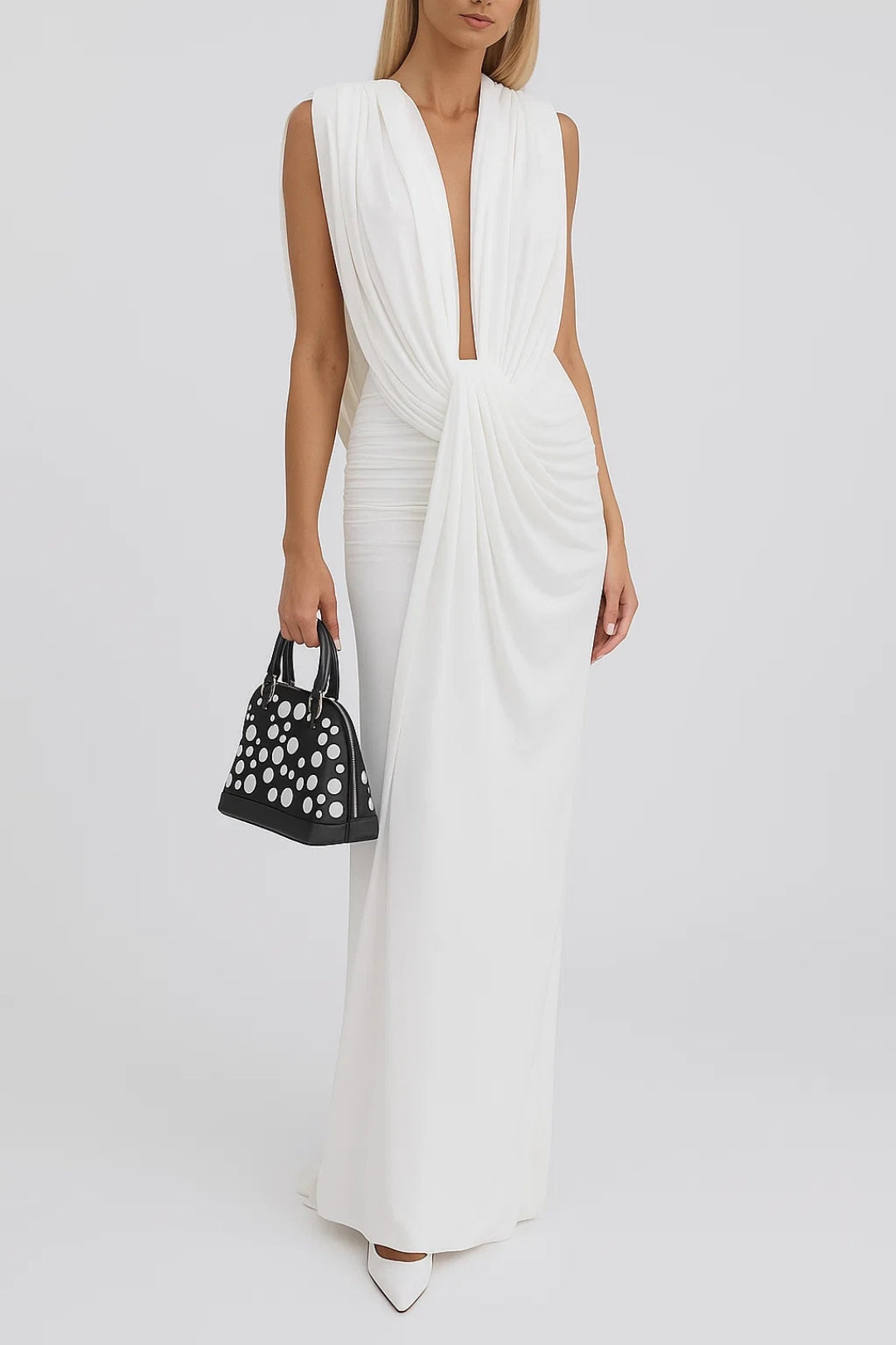 Lange elegante jurk met draperie aan de voorkant