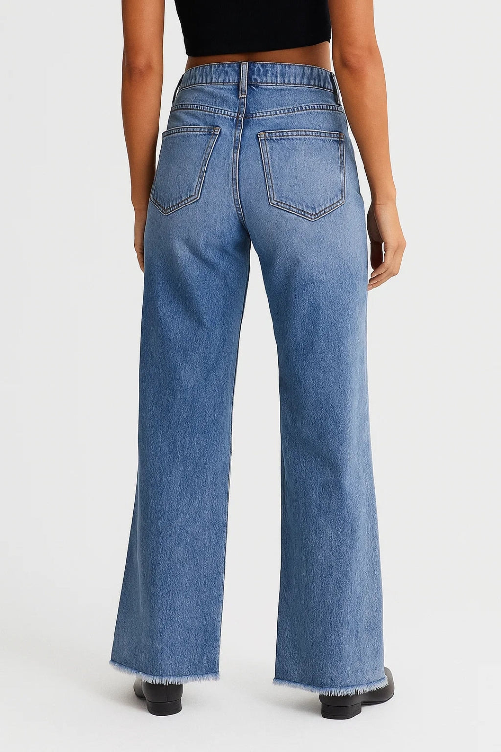 Flared jeans met rafelige zoom