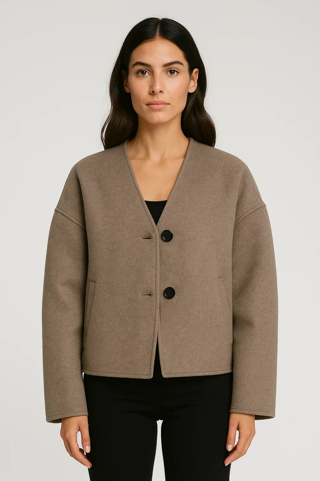 Damesjas met V-hals en Knoopsluiting